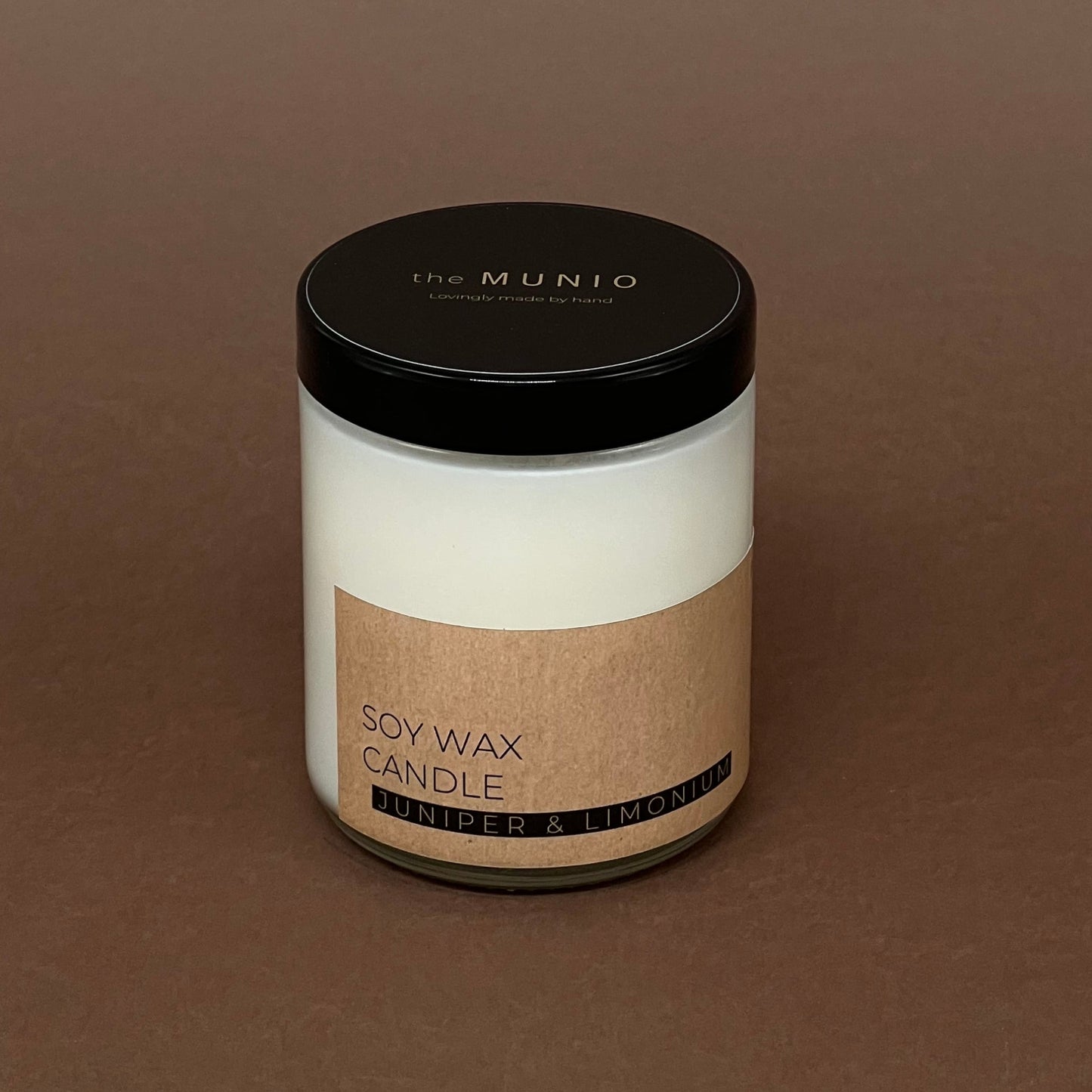 Kadiķu un limoniju svece stikla traukā