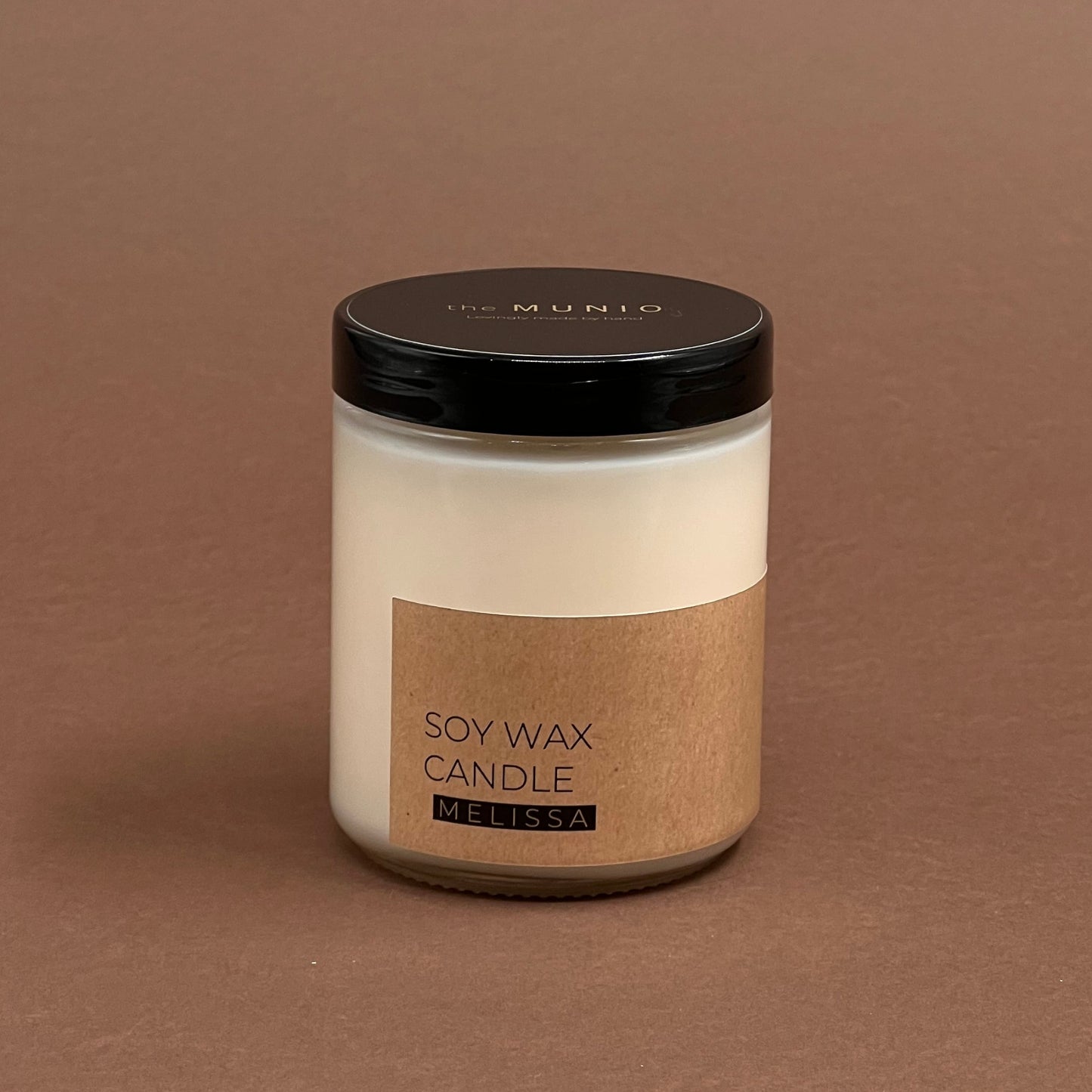 Melisas svece stikla burciņā