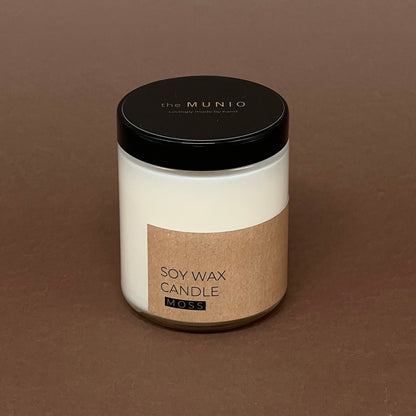 Sūnu svece stikla traukā