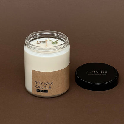 Sūnu svece stikla traukā