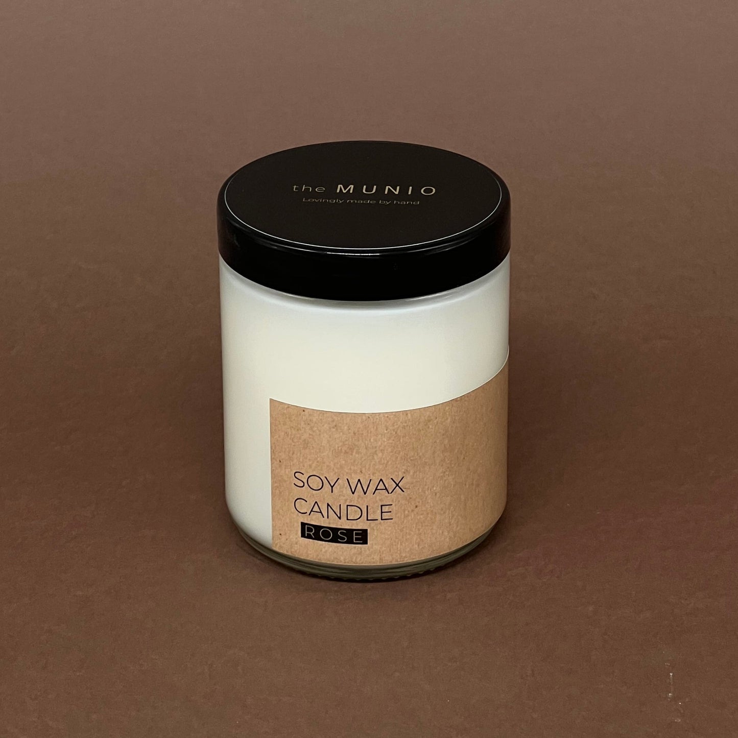 Rožu svece stikla traukā